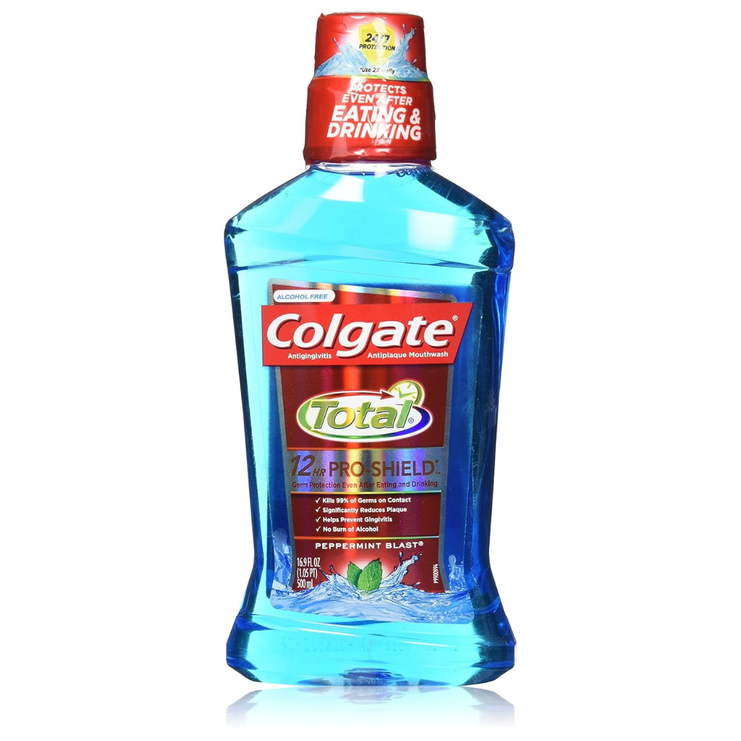 Enjuague bucal COLGATE Total Peppermint Blast para protección total y aliento fresco.