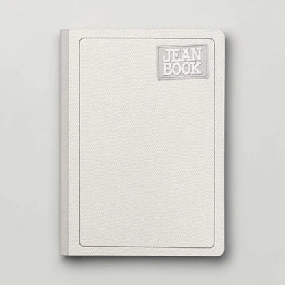A light gray textured hardcover notebook with a silver-gray metallic 'JEAN BOOK' logo plaque on the top right, shown on a matching light gray background.