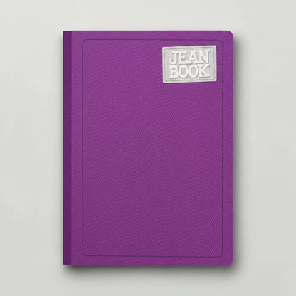 A light gray textured hardcover notebook with a silver-gray metallic 'JEAN BOOK' logo plaque on the top right, shown on a matching light gray background.