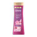 Jabón Corporal Líquido Caress Peony Almond Blossom, 591 ml