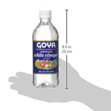 A bottle of Goya distilled white vinegar shown on a white background with a gray hand silhouette underneath and a vertical measurement marker indicating 8.0 in (20 cm) height.