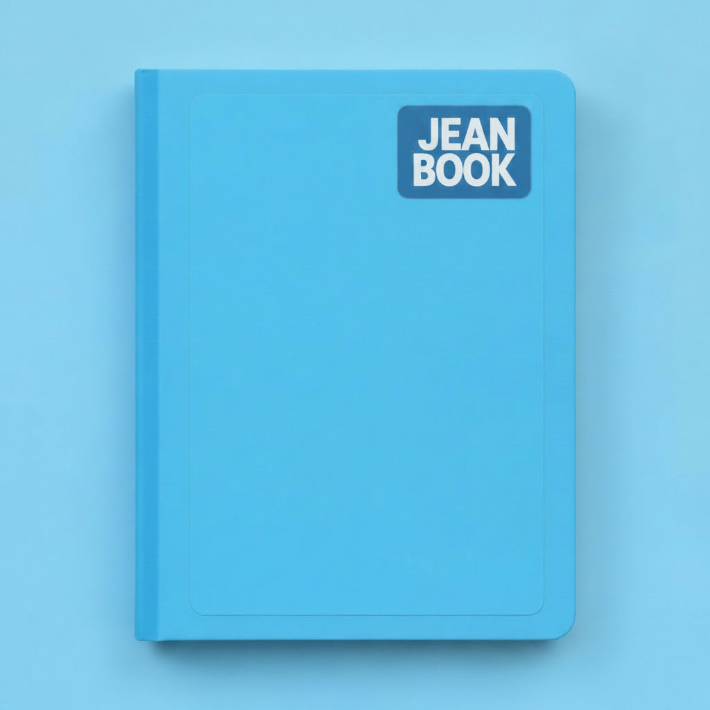 A bright blue hardcover notebook or journal with a small white square label on the front cover, shown against a solid blue background.