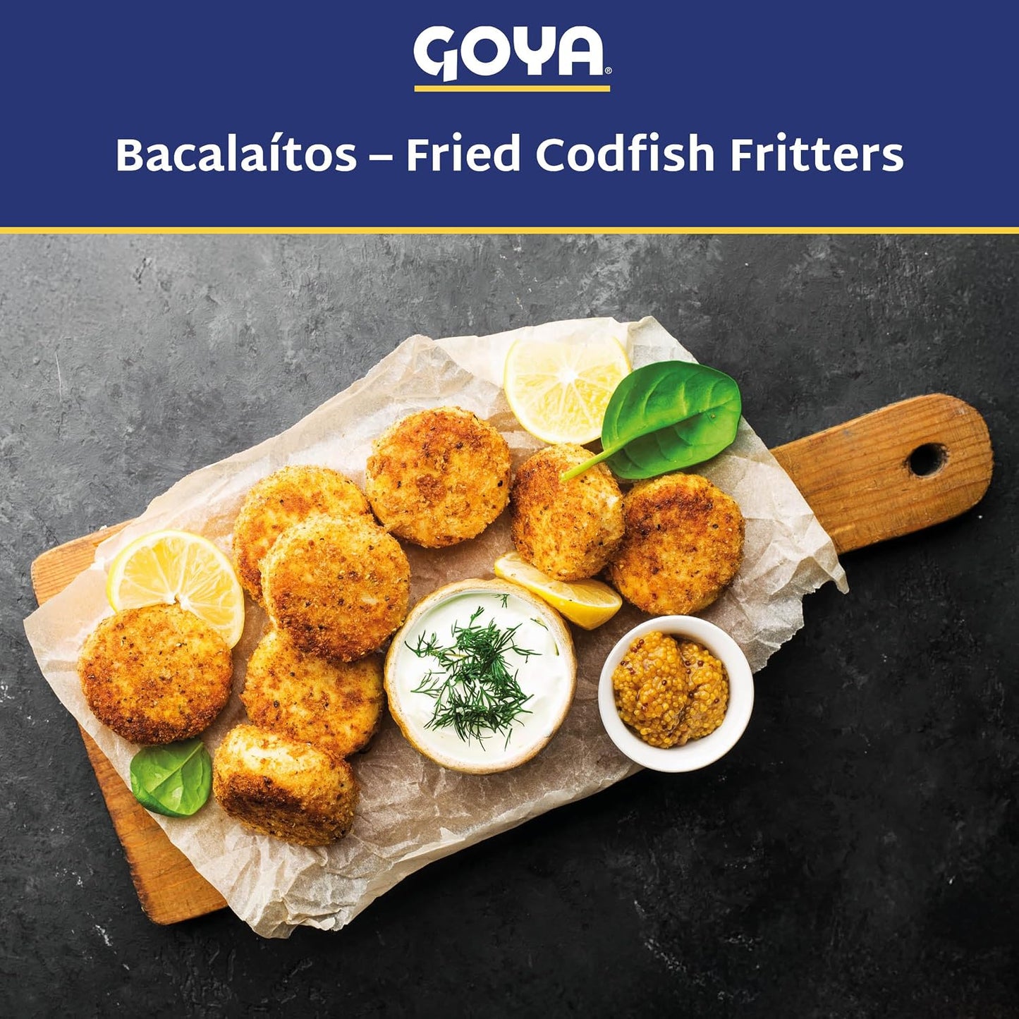 Fried codfish fritters on a wooden board with Goya logo above.
