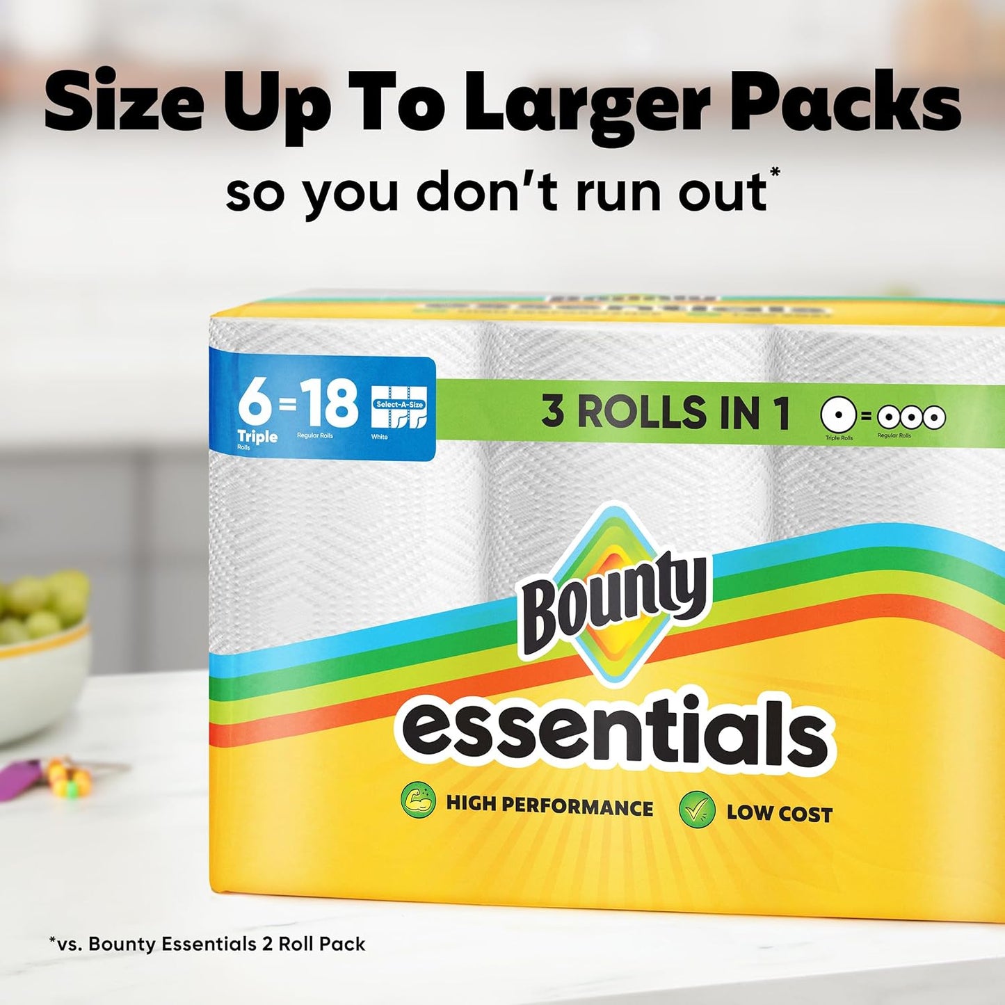 Bounty essentials paper towels packaging with text on a kitchen counter.