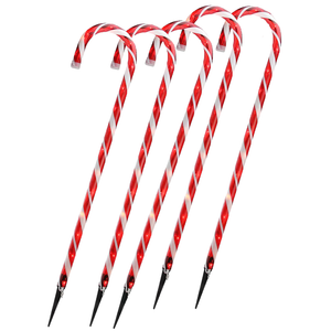 Red and white striped sticks with black tips on a white background