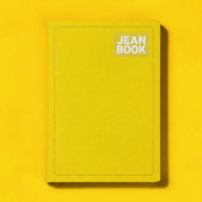 Yellow notebook with 'JEAN BOOK' branding on a yellow background