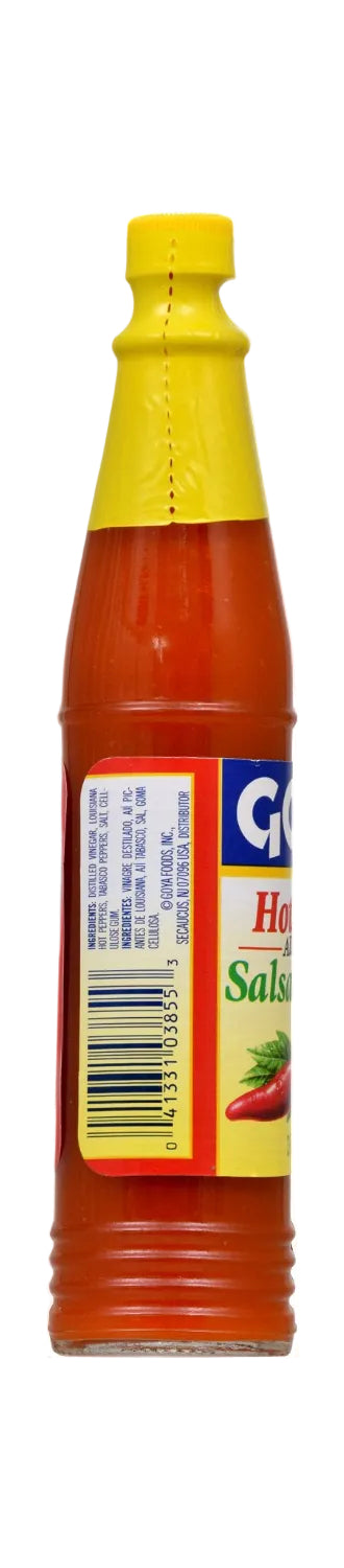 A bottle of hot sauce with a yellow cap and a red, yellow, and blue label, shown against a plain white background.