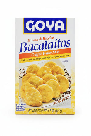 Box of Goya Bacalaitos Codfish Fritter Mix with codfish fritters on a plate.