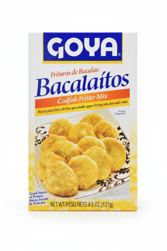 Box of Goya Bacalaitos Codfish Fritter Mix with codfish fritters on a plate.