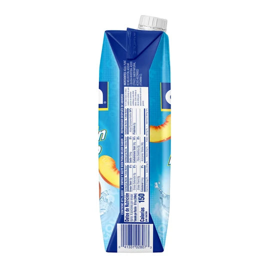 A blue carton of juice with a white cap, shown from the side on a plain white background. The carton features peach slices and partial branding.