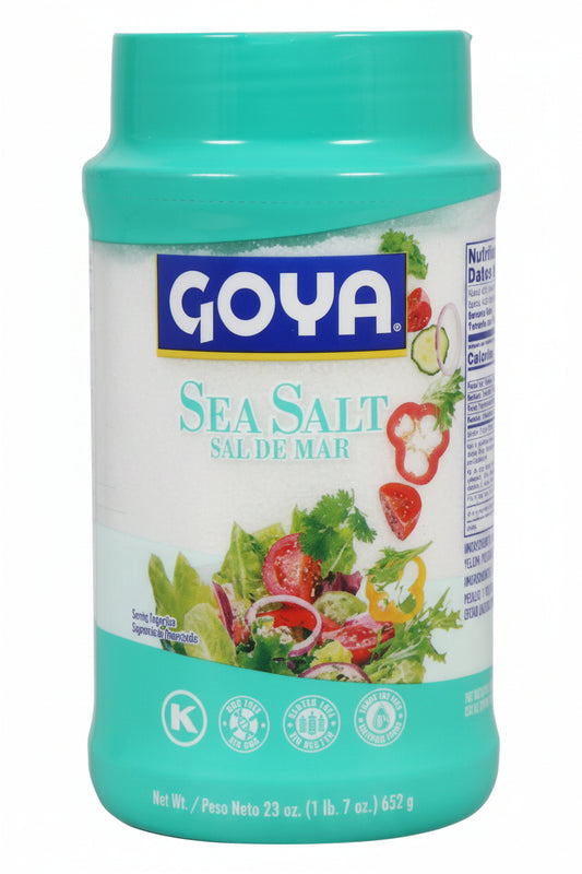 A container of Goya Sea Salt on a plain white background. The container is a bright turquoise color with a matching turquoise lid, featuring the blue and white Goya logo and an illustration of fresh salad vegetables on the front label.
